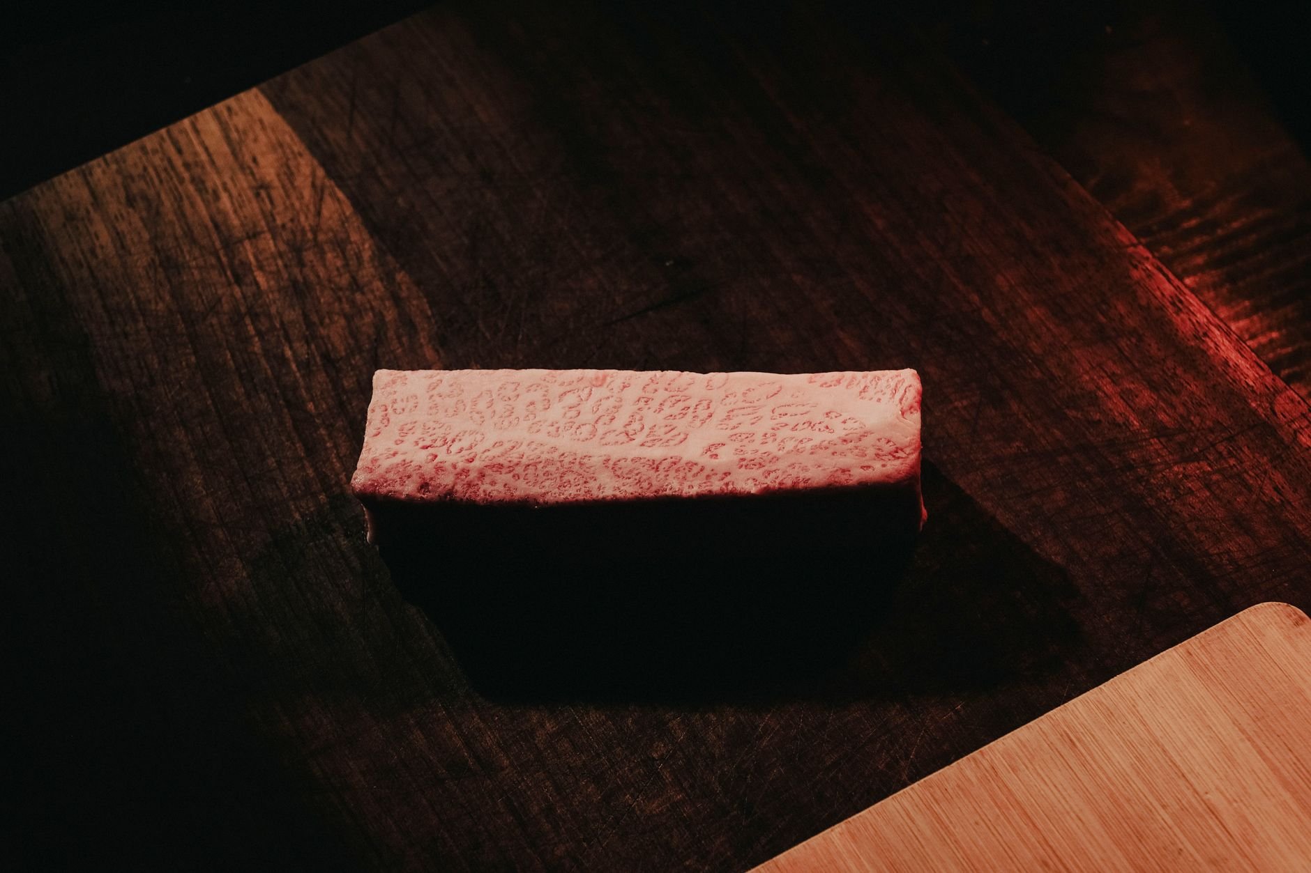 Close-up of premium beef, showcasing the rich texture and quality of Snack Protein jerky